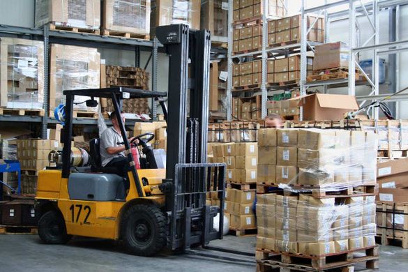 A forklift being driven by a qualified driver